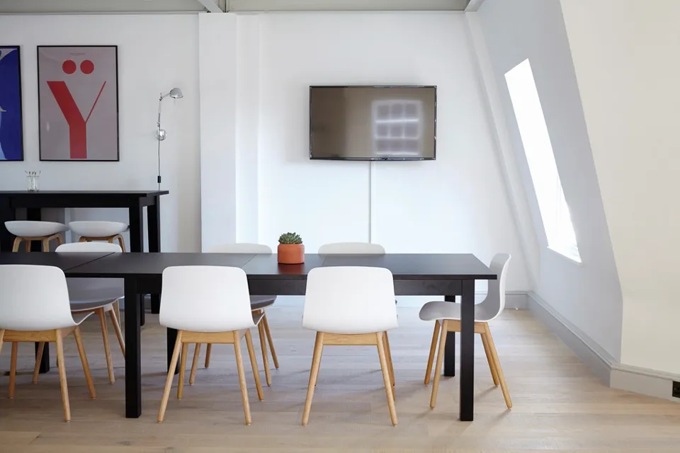 Rows of desks in a coworking space